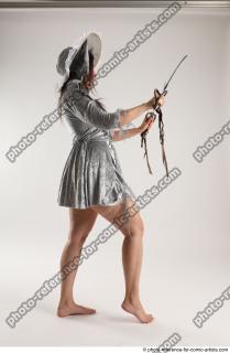 Luci_Aviol Standing Pose With Two Stords